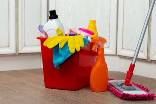 Regular house cleaning supplies and mop ready for a recurring home cleaning in Hanford, CA
